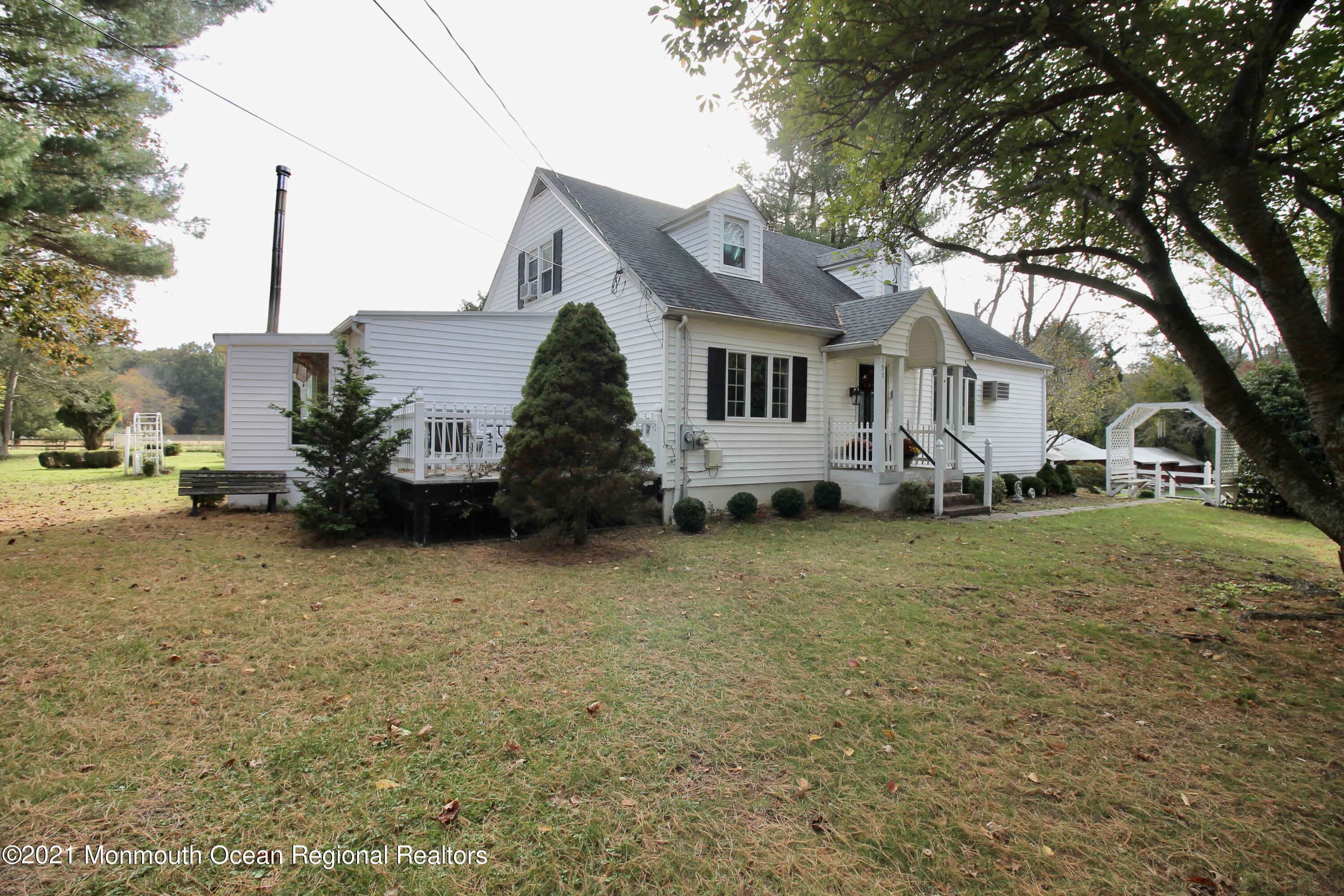 195 Bennett Road Freehold, NJ 07728 - Photo 5 of 90 a front view of a house with a garden