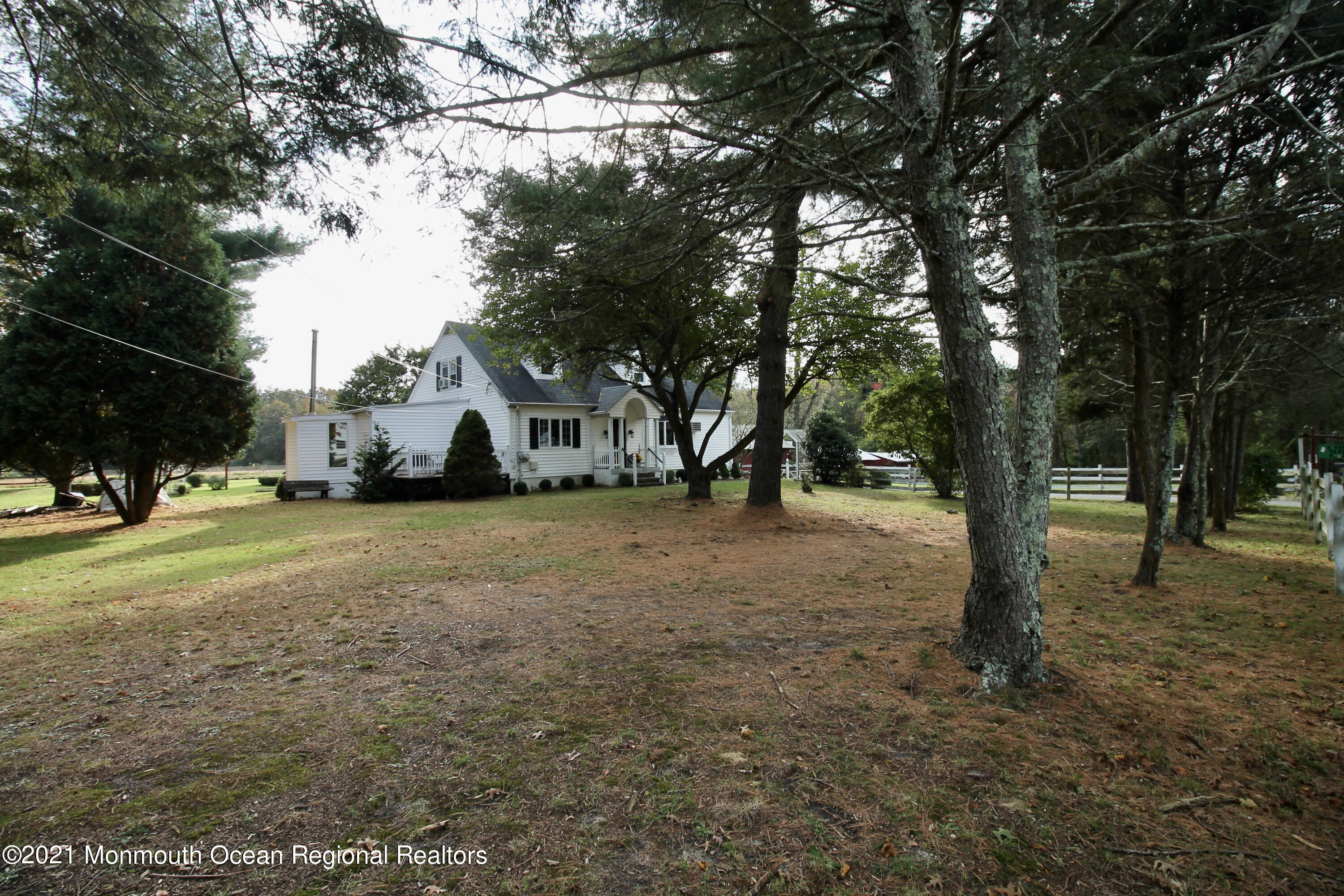 195 Bennett Road Freehold, NJ 07728 - Photo 6 of 90 a view of yard with tree in the background