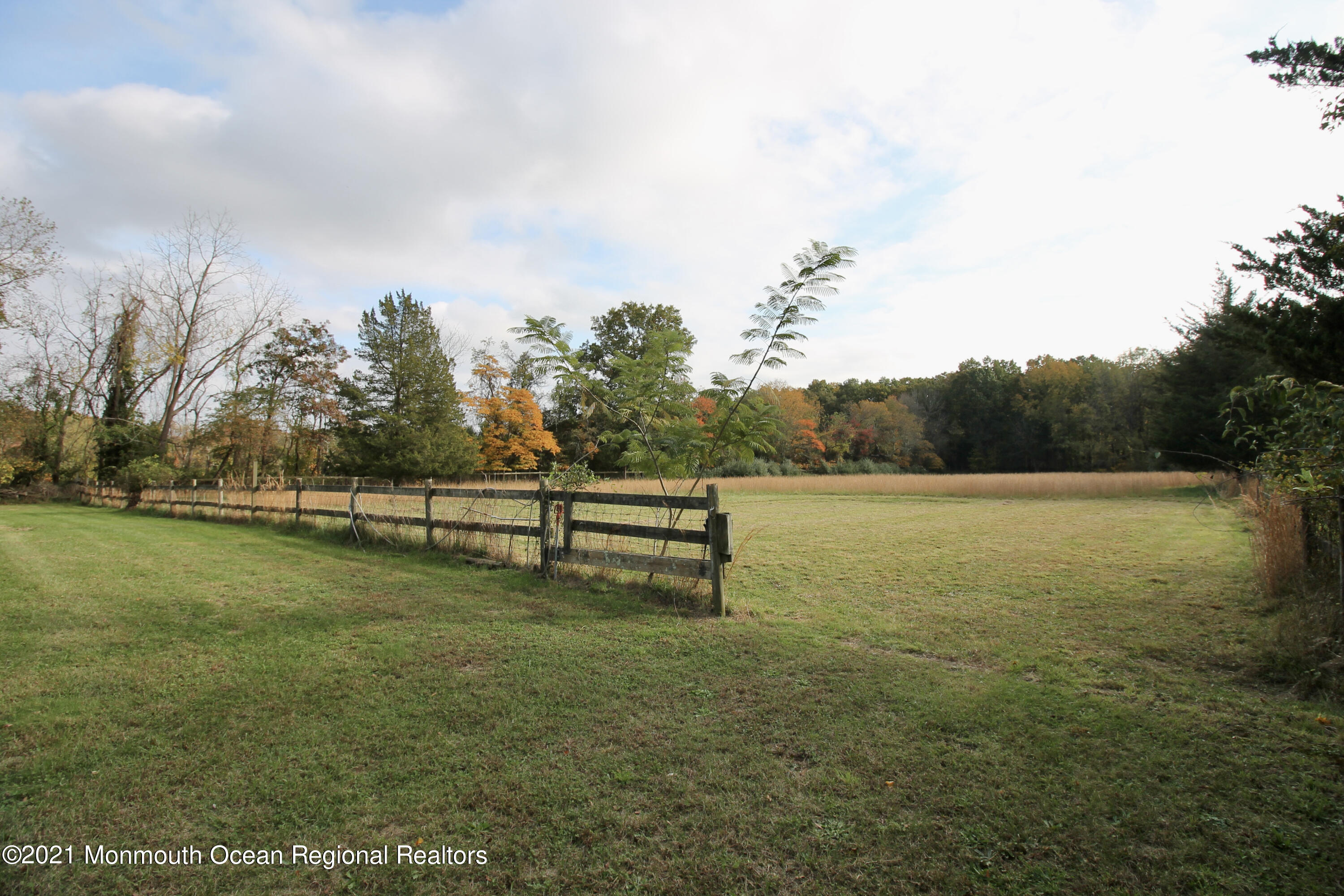 195 Bennett Road Freehold, NJ 07728 - Photo 52 of 90 a view of a field with wooden fence