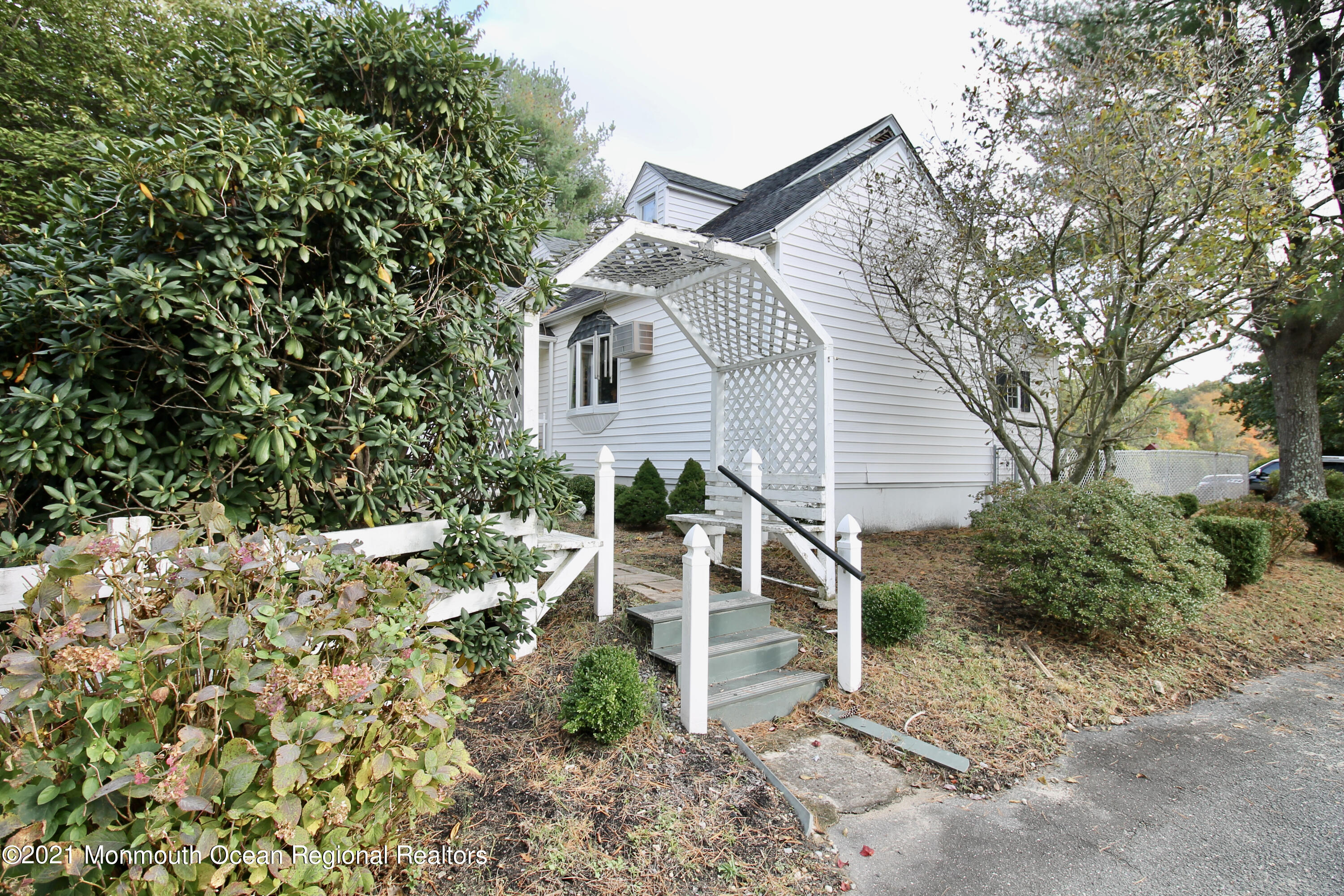 195 Bennett Road Freehold, NJ 07728 - Photo 9 of 90 a view of a house with a yard and potted plants
