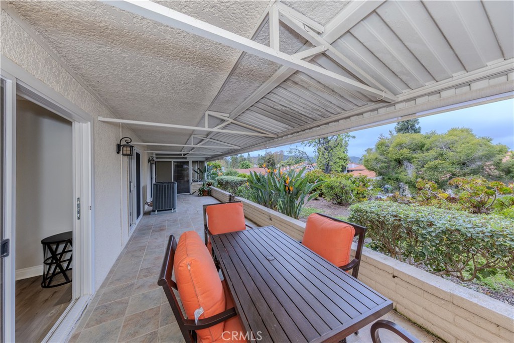 3379 Punta Alta, Unit B Laguna Woods, CA 92637 - Photo 21 of 25 a outdoor view with a sitting space