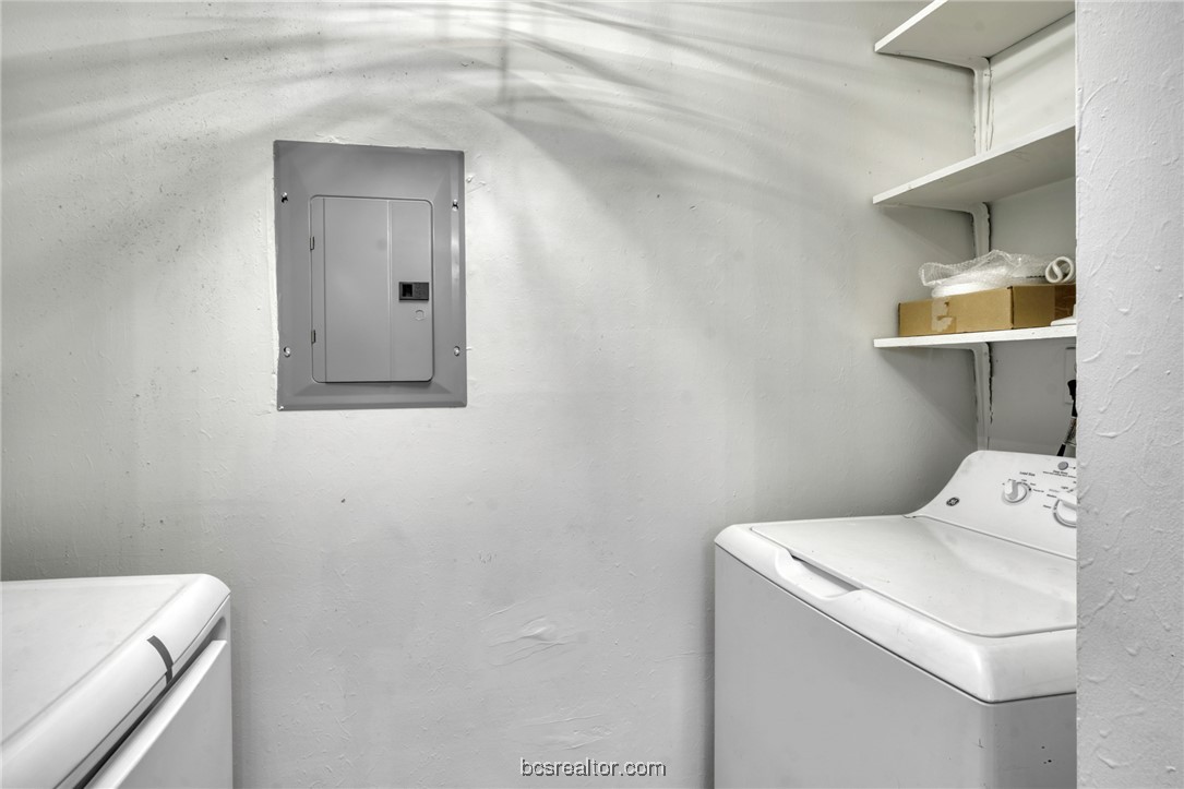 2807 Sprucewood Street, Unit A Bryan, TX 77801 - Photo 8 of 13 Washroom with electric panel and separate washer and dryer