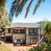 a front view of a house with a porch