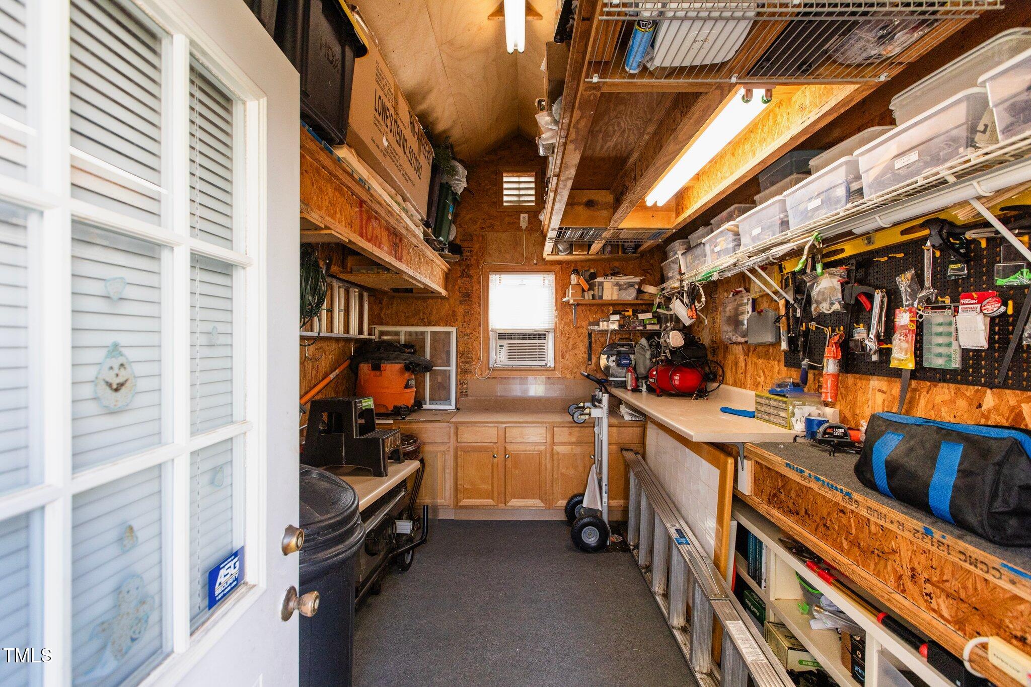 5405 Seaspray Lane Raleigh, NC 27610 - Photo 38 of 48 Workshop Interior