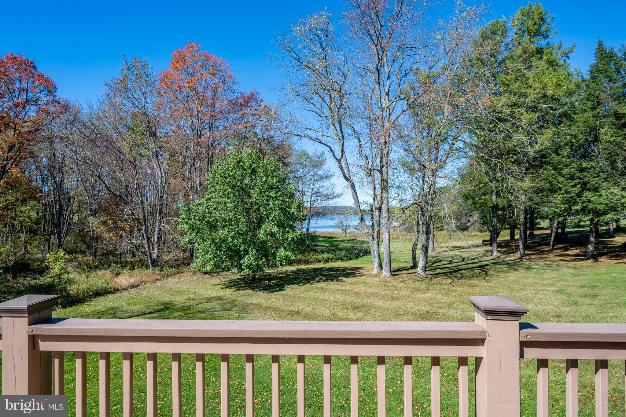 32 Hazelhurst Lane Swanton, MD 21561 - Photo 13 of 73 a view of a yard with wooden fence