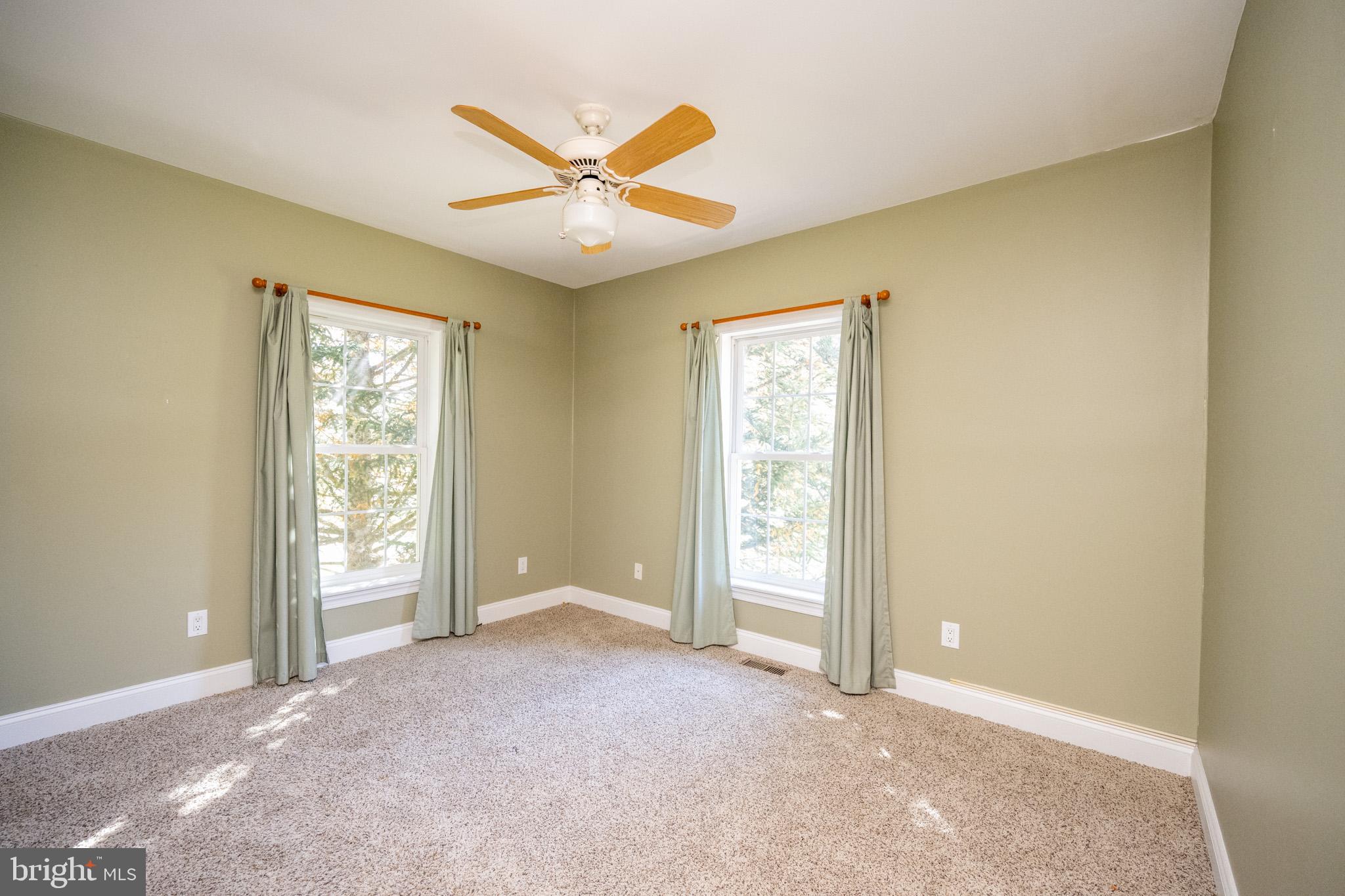 32 Hazelhurst Lane Swanton, MD 21561 - Photo 25 of 73 an empty room with windows and closet
