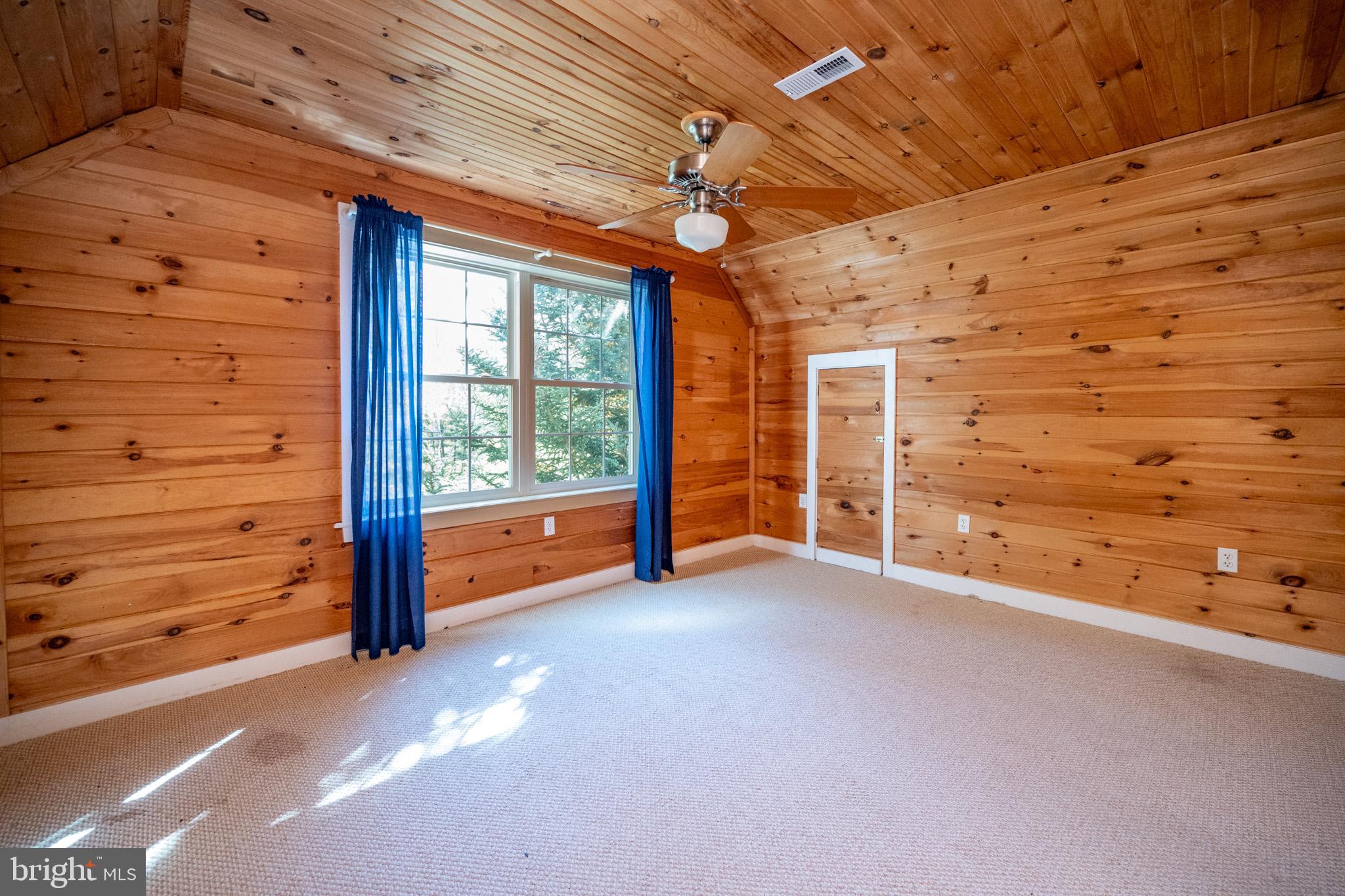 32 Hazelhurst Lane Swanton, MD 21561 - Photo 45 of 73 a view of an empty room with a fireplace