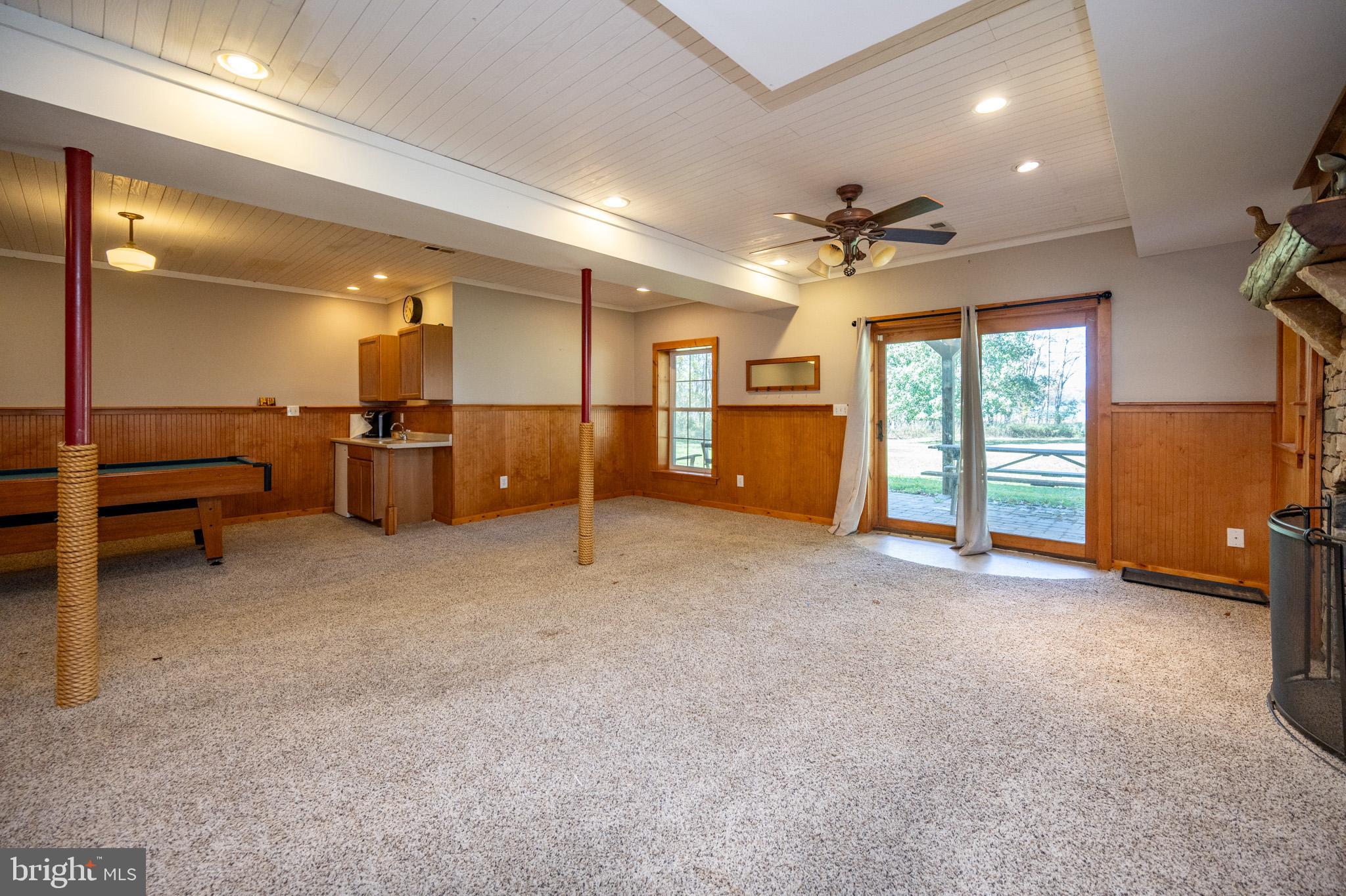 32 Hazelhurst Lane Swanton, MD 21561 - Photo 52 of 73 a view of a livingroom with furniture and a ceiling fan