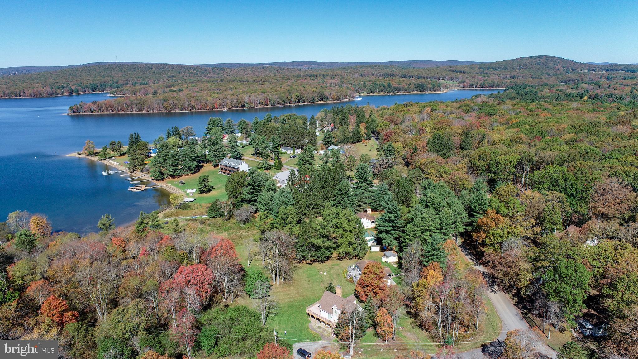 32 Hazelhurst Lane Swanton, MD 21561 - Photo 72 of 73 a view of a lake with a mountain in the background