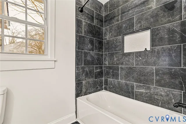 a bathroom with a bathtub