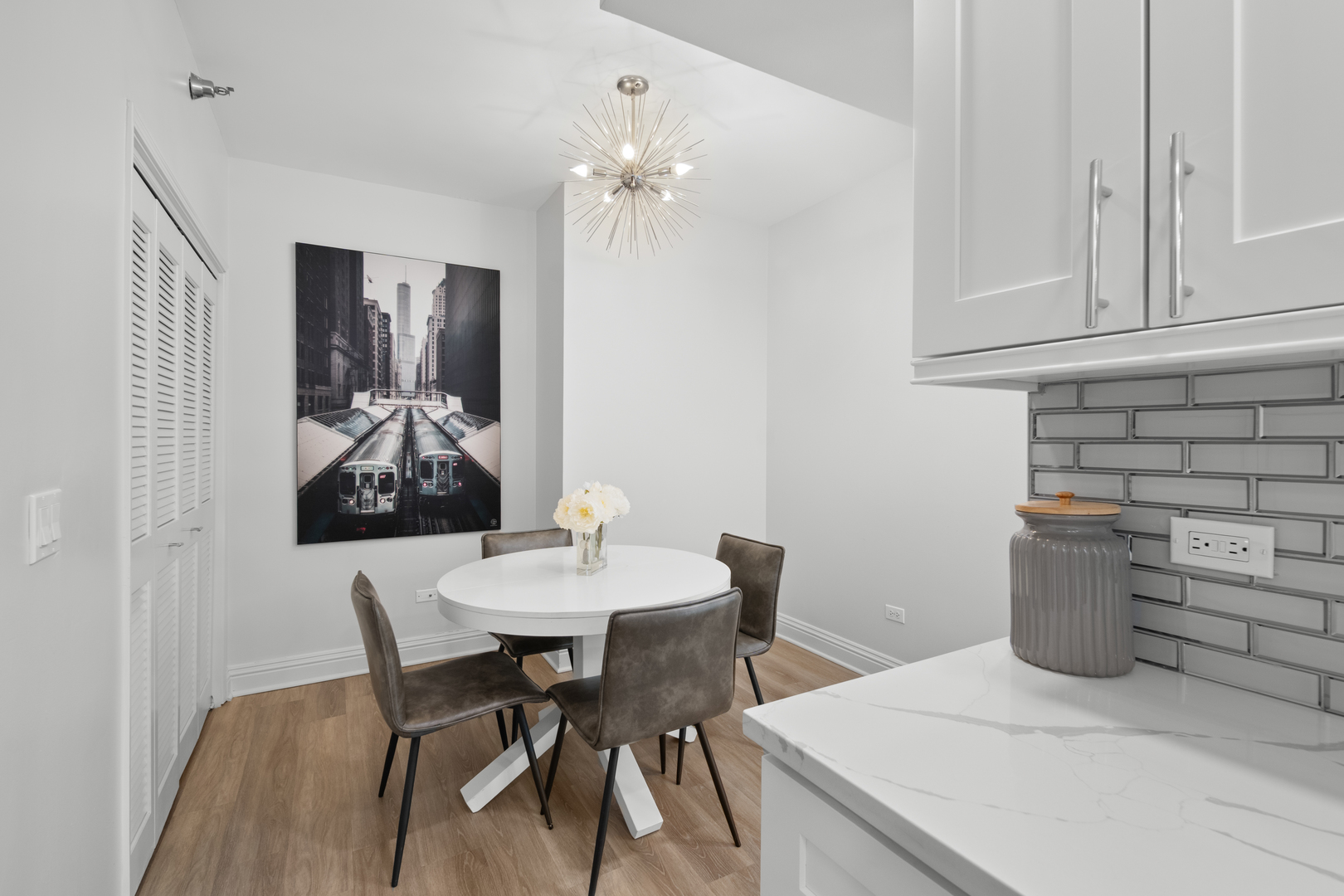 55 West Delaware Place, Unit 614 Chicago, IL 60610 - Photo 7 of 21 a view of a dining room with furniture