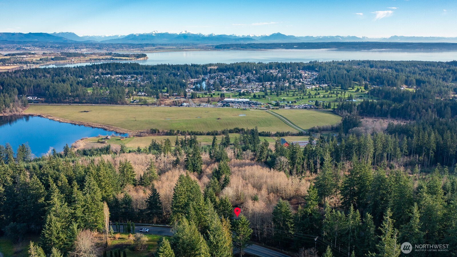 a view of a lake with a city