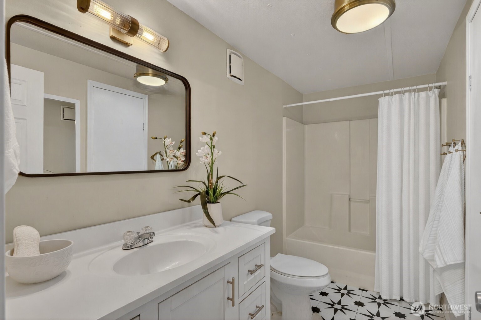 63 North Cross Island Road Camano Island, WA 98282 - Photo 14 of 23 a bathroom with a granite countertop sink toilet and shower