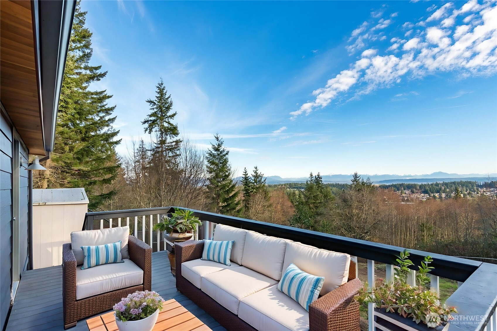 63 North Cross Island Road Camano Island, WA 98282 - Photo 2 of 23 a view of a balcony with chairs
