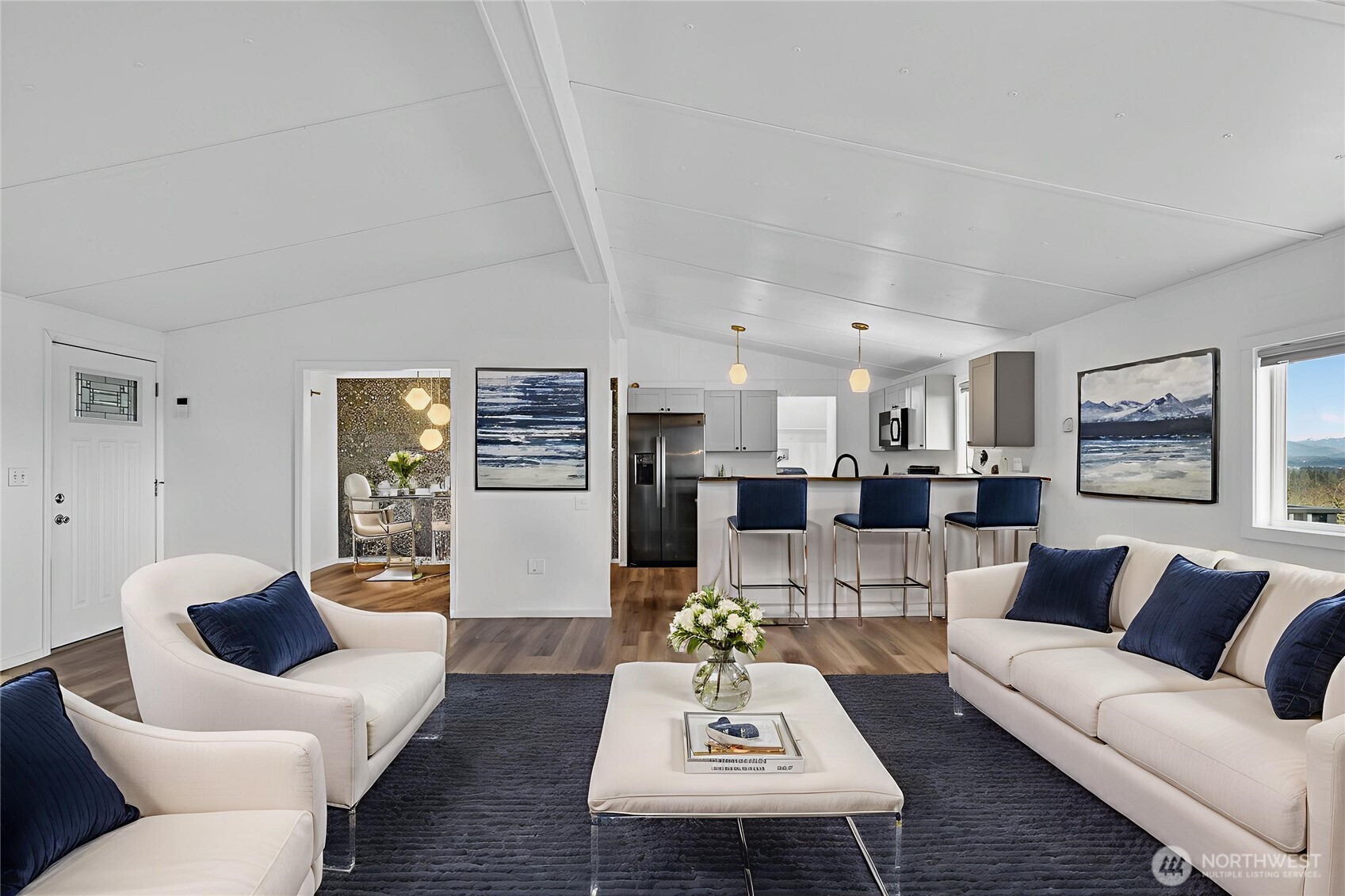 63 North Cross Island Road Camano Island, WA 98282 - Photo 6 of 23 a living room with furniture and wooden floor