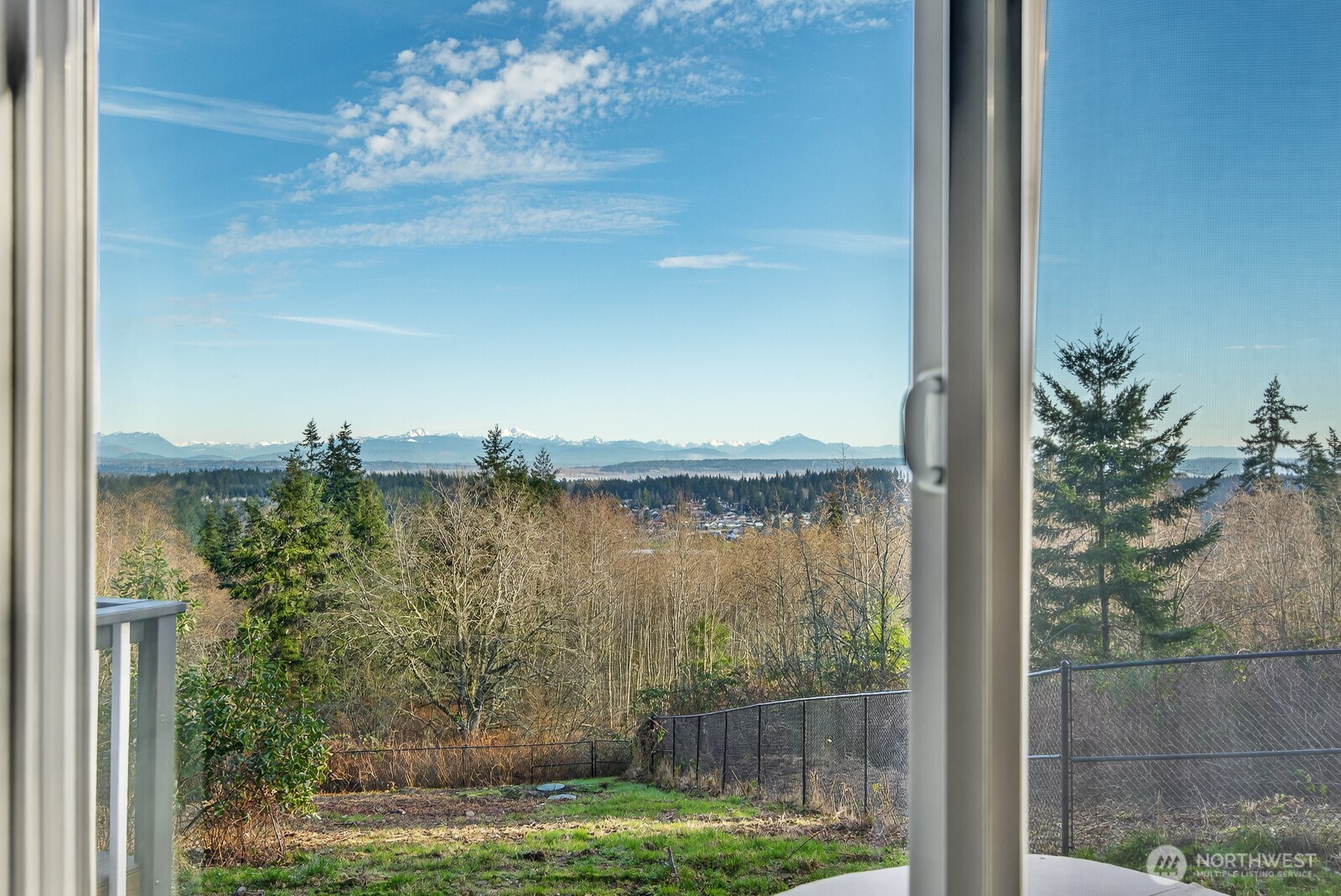 63 North Cross Island Road Camano Island, WA 98282 - Photo 8 of 23 a view of a lake from a balcony