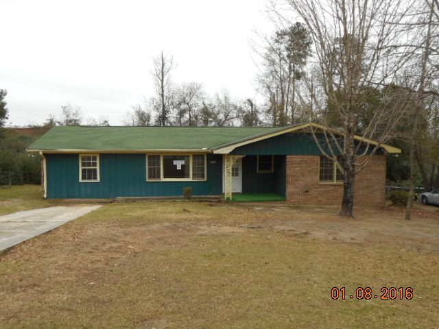4602 Bishop Road Macon, GA 31206 - Photo 1 of 11 a house with trees in the background