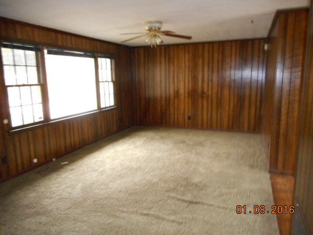 4602 Bishop Road Macon, GA 31206 - Photo 2 of 11 an empty room with windows