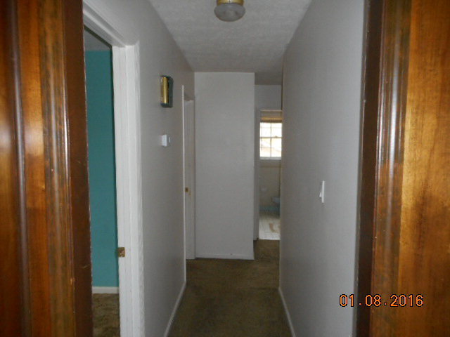4602 Bishop Road Macon, GA 31206 - Photo 6 of 11 a view of a hallway with wooden floor
