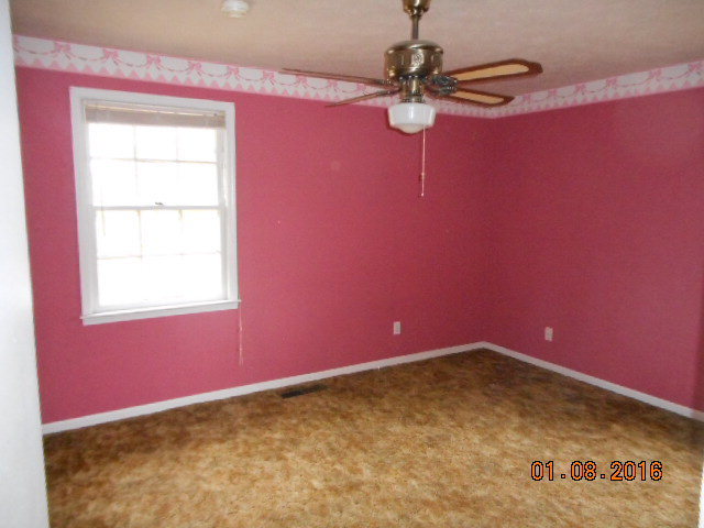 4602 Bishop Road Macon, GA 31206 - Photo 9 of 11 a view of a livingroom with an empty space and a window