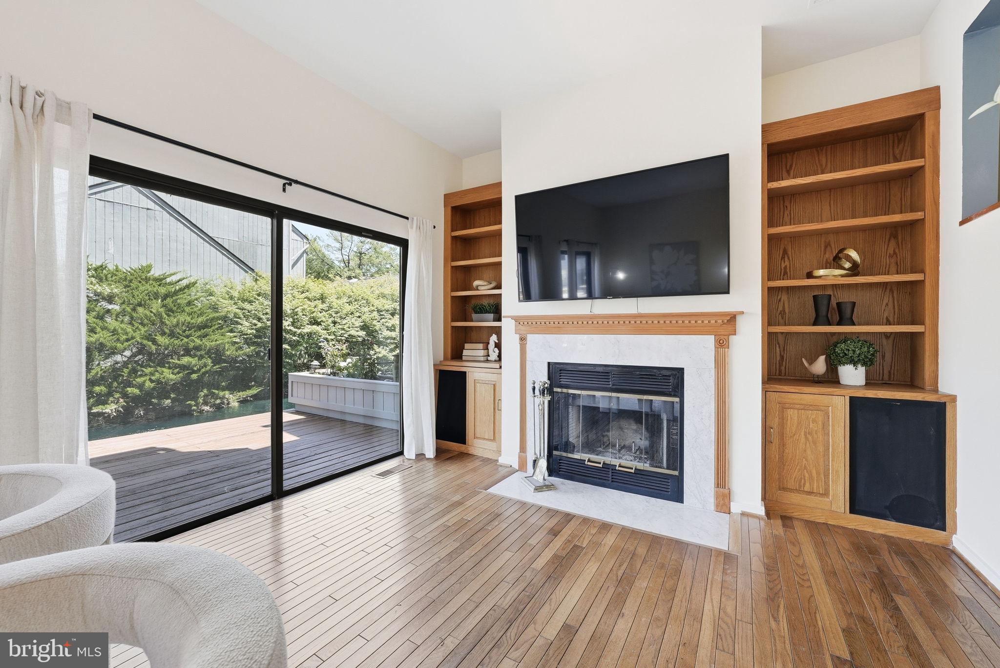 11124 Glade Drive Reston, VA 20191 - Photo 5 of 47 Spacious Living Room Overlooking The Wharf Pond