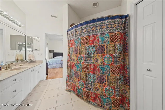 a view of a swimming pool with a yard