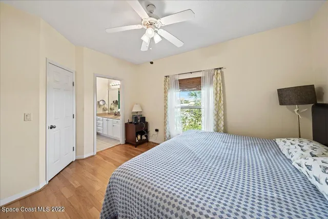 a view of lake from under an umbrella