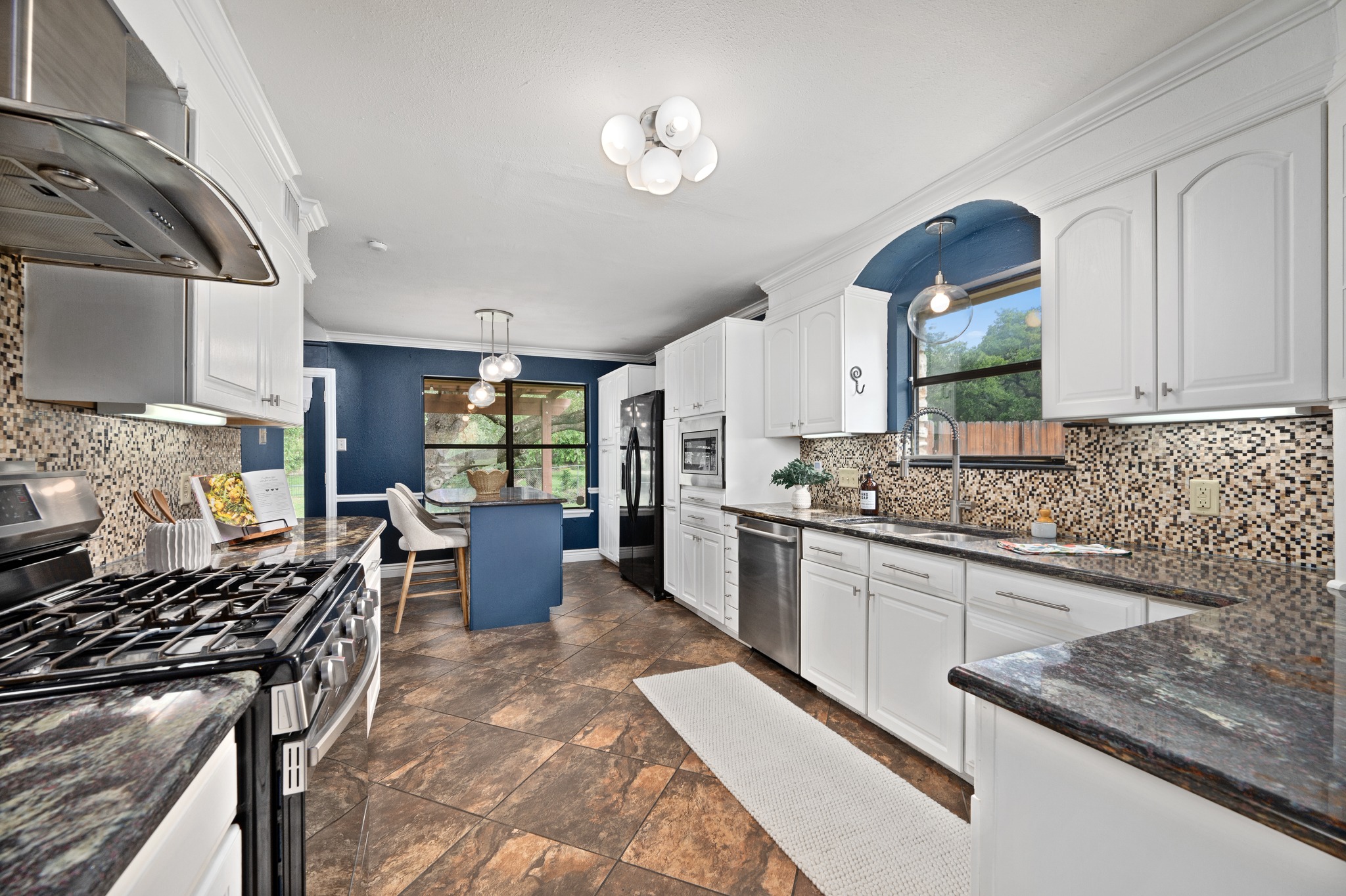 3908 Valley View Round Rock, TX 78681 - Photo 14 of 39 The kitchen was designed for function without sacrificing style.