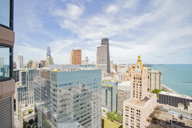 a view of a city with tall buildings