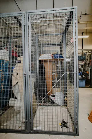 a large white kitchen with stainless steel appliances