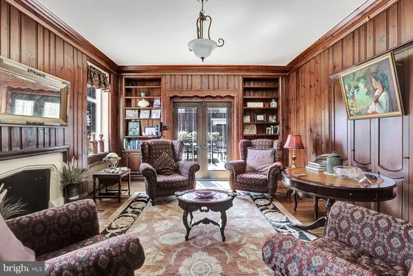 a bedroom with a bed and a table in it