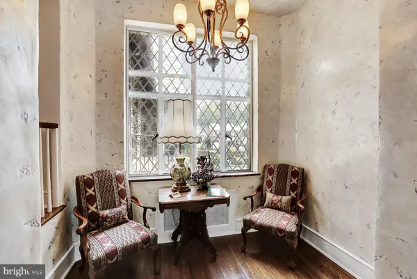 a bathroom with a sink a toilet a tub and shower