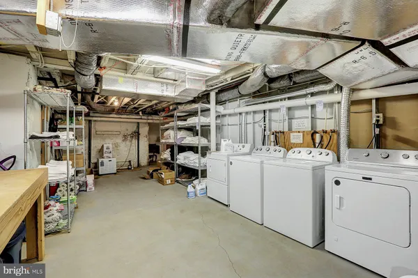 an aerial view of a house with a lake view