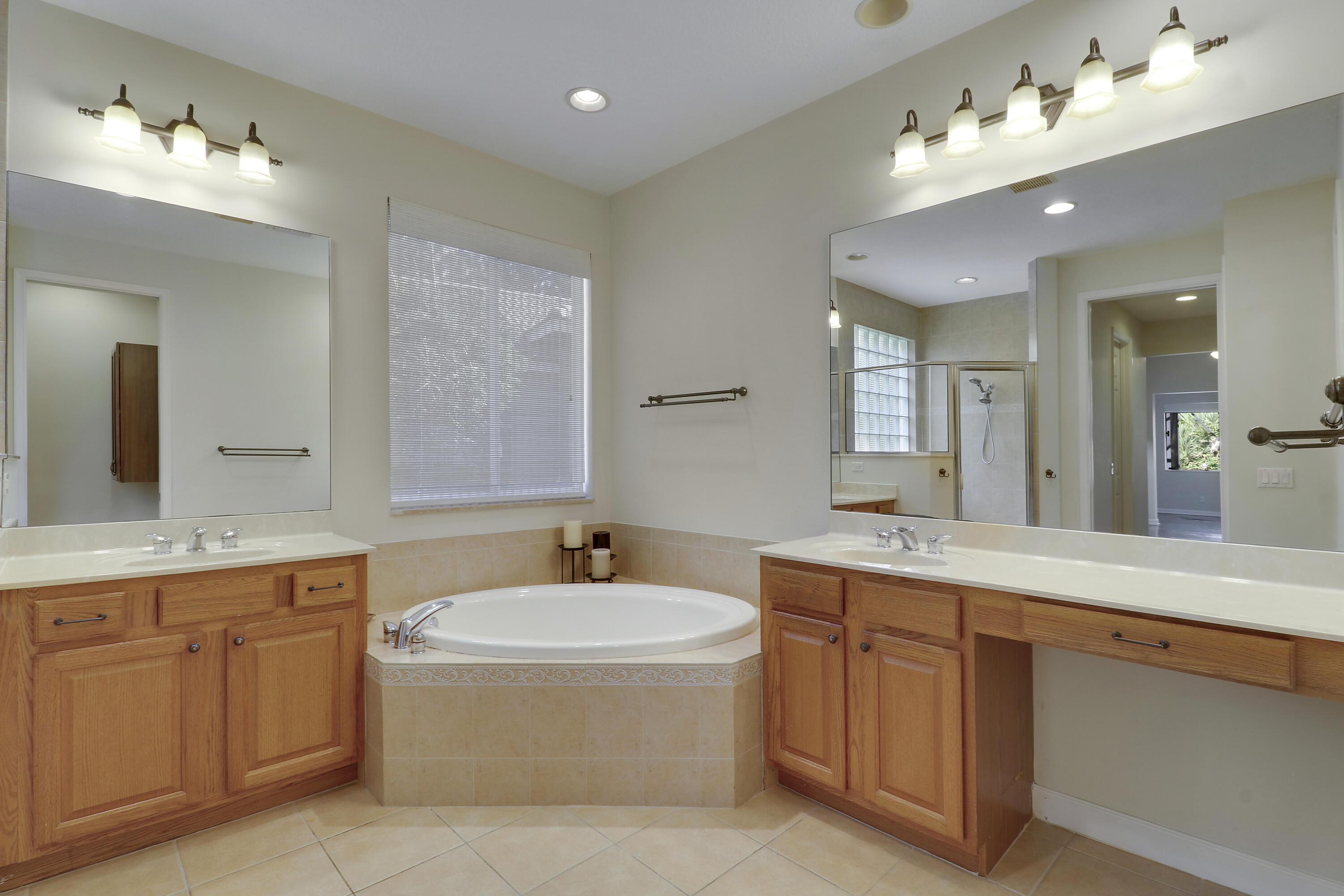 8605 Tompson Point Road Port St. Lucie, FL 34986 - Photo 40 of 90 Primary Ensuite