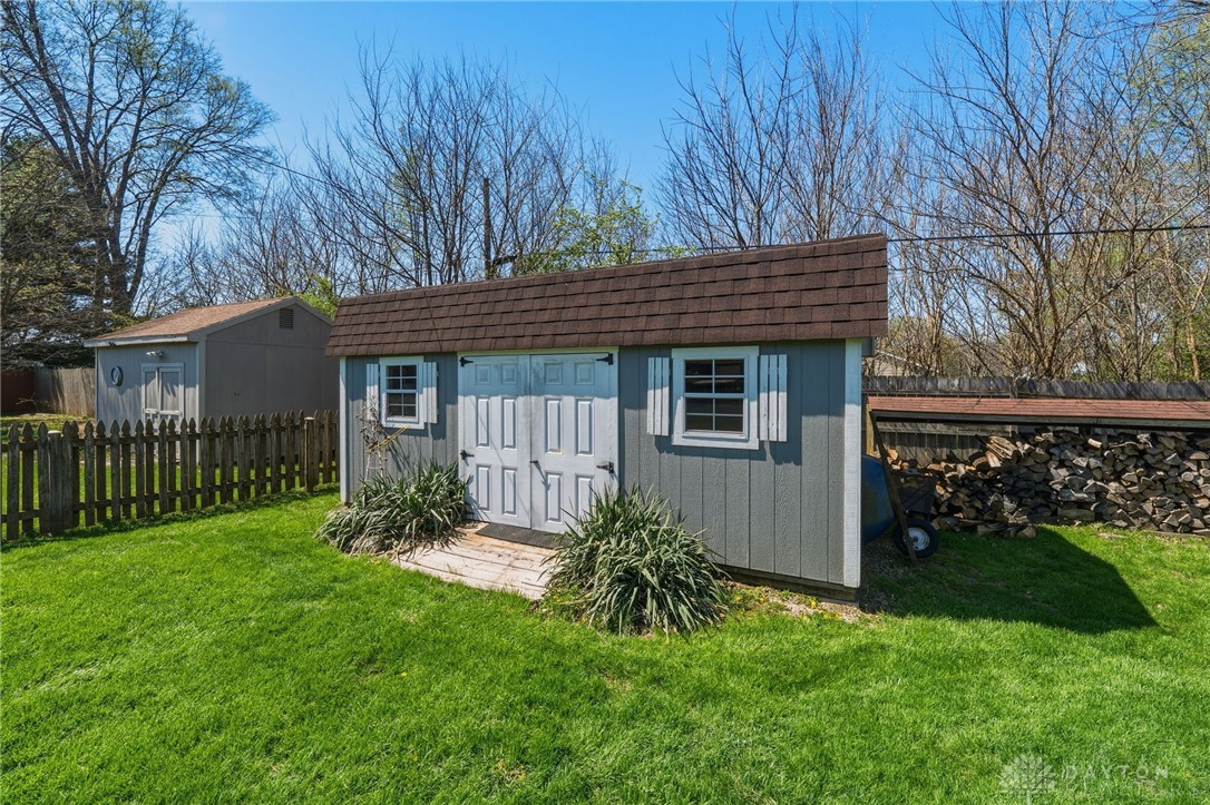 2945 Ashlar Drive Springfield, OH 45503 - Photo 18 of 20 This charming backyard shed offers convenient storage and enhances outdoor living space.