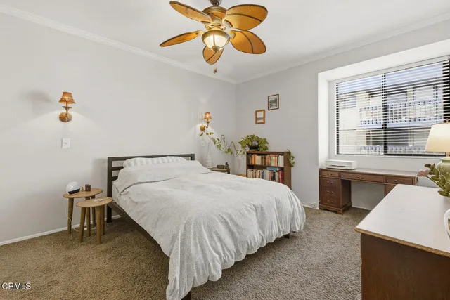 a view of a bathroom with a glass shower door
