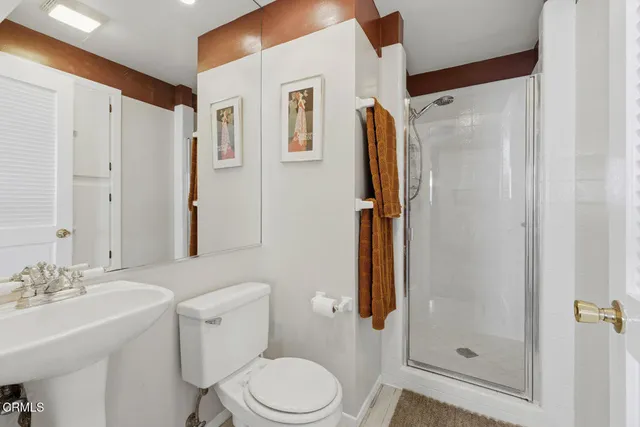 a view of a swimming pool with a lounge chairs