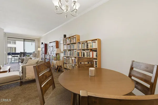 a kitchen with stainless steel appliances granite countertop a sink refrigerator and microwave