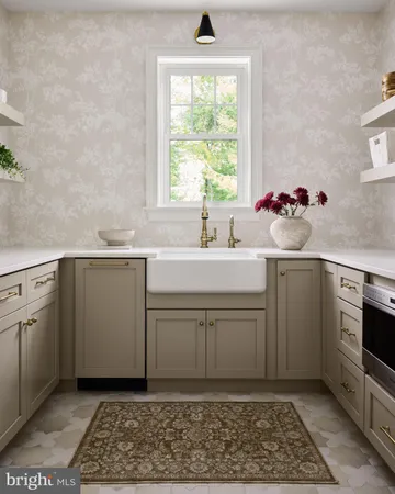 a kitchen with a sink cabinets and appliances