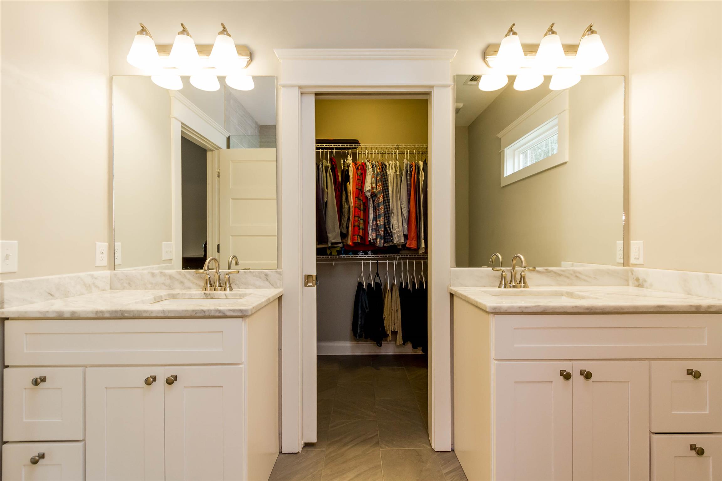 5488 Roy Pitt Road Springfield, TN 37172 - Photo 15 of 27 a bathroom with a sink vanity and a mirror