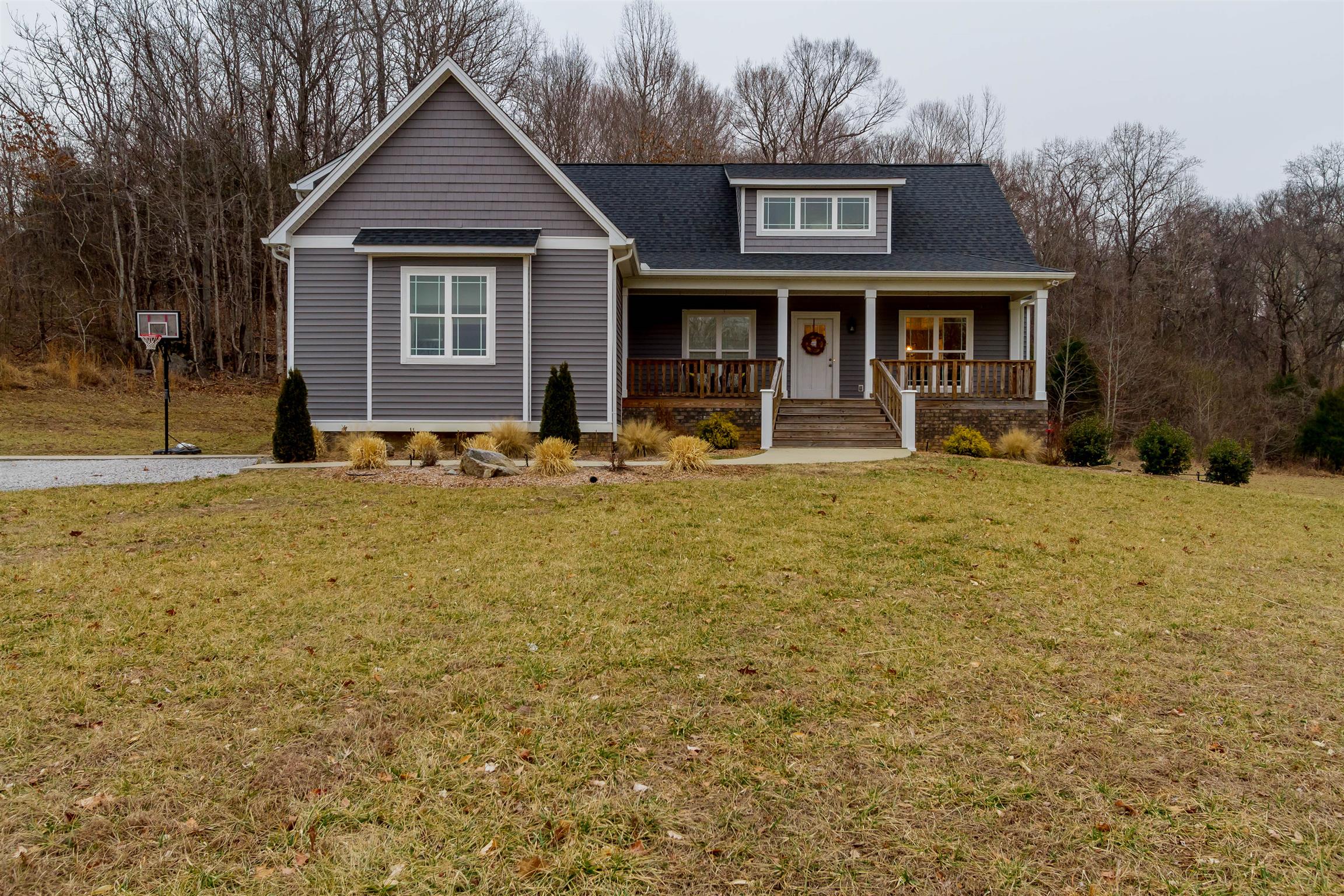 5488 Roy Pitt Road Springfield, TN 37172 - Photo 2 of 27 a front view of a house with a yard