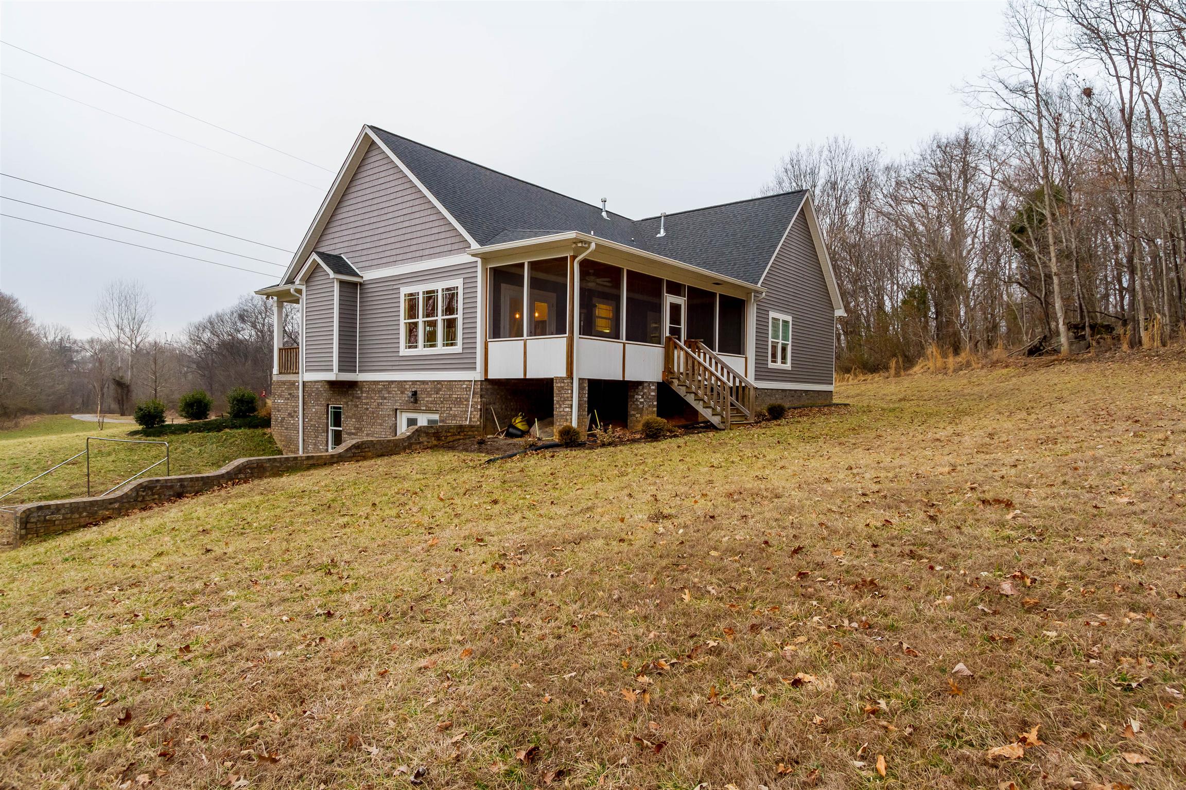 5488 Roy Pitt Road Springfield, TN 37172 - Photo 6 of 27 a front view of a house with a yard