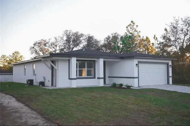 a view of a backyard with a garden
