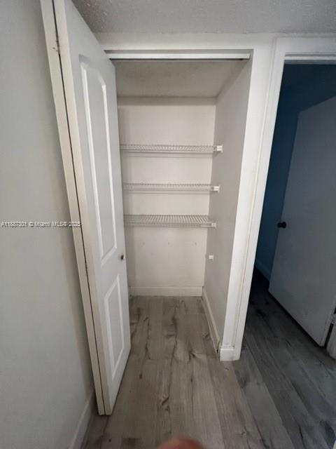 7001 Environ Boulevard, Unit 308 Lauderhill, FL 33319 - Photo 3 of 5 a view of a room with wooden floor