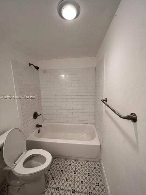 7001 Environ Boulevard, Unit 308 Lauderhill, FL 33319 - Photo 4 of 5 a bathroom with a bath tub and a shower