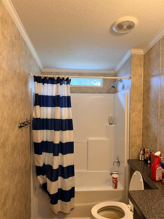 3520 East Gaskins Road, Unit LOT 5 Bartow, FL 33830 - Photo 14 of 16 a bathroom with a sink toilet and shower