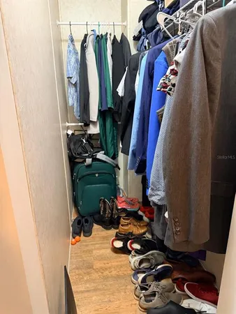 a room with lots of different colored cloths