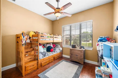a bed room with furniture and a window