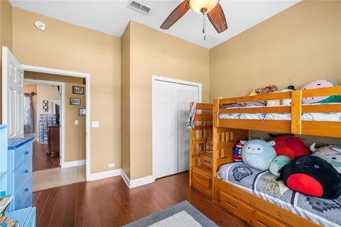 a bedroom with furniture and a window