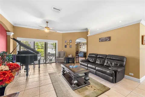 a living room with furniture and a table